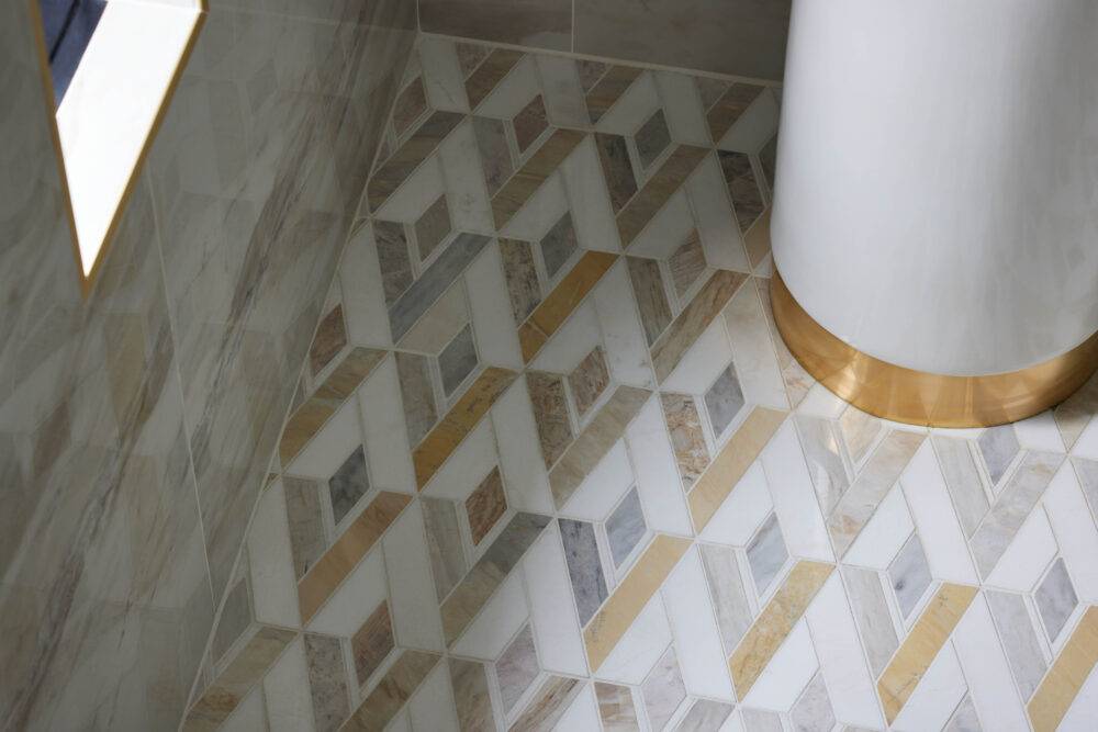 White and taupe diamond-shaped mosaic tile floor. 