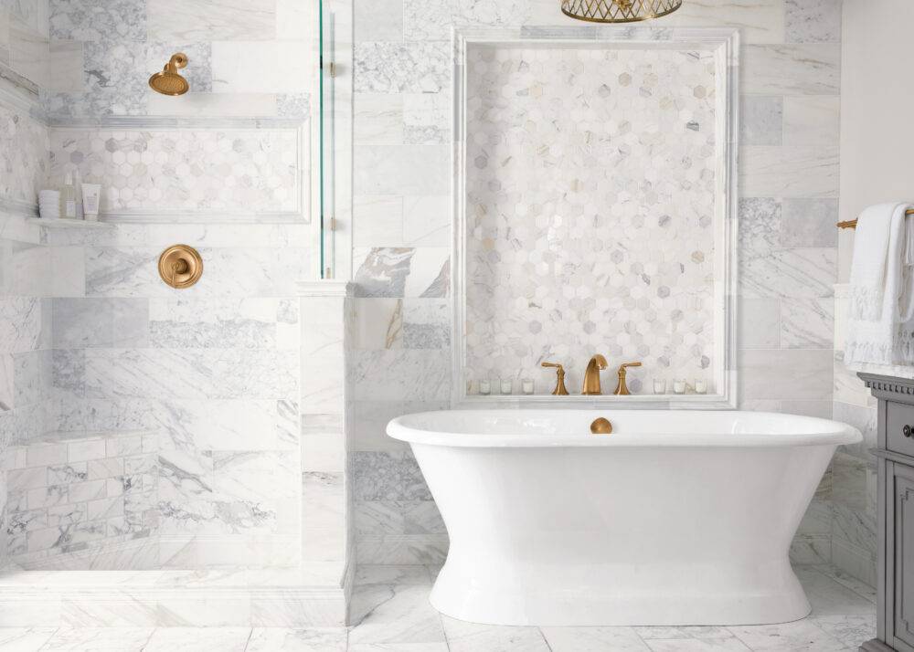 White marble bathroom with bold veining. 