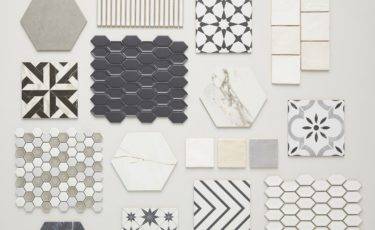 flatlay of neutral patterned tile and tile mosaics