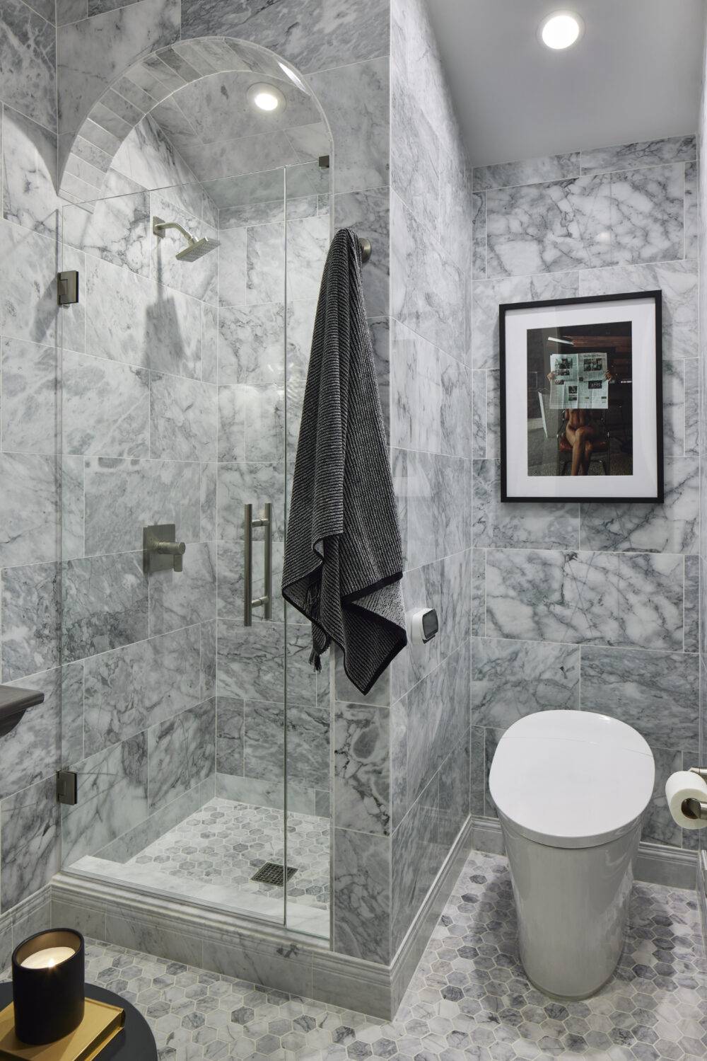 Bathroom with grey Ashford Cararra marble wall and floor tile. 