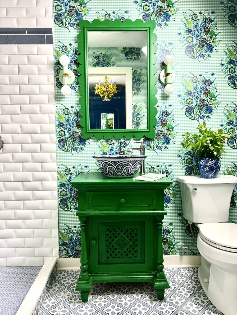 Colorful green and blue bathroom featuring Laura Ashley Mr Jones Midnight floor tile.